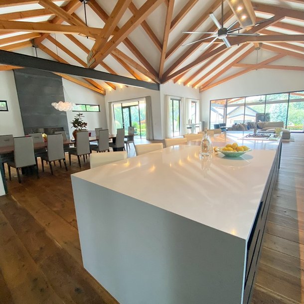 A styled kitchen with a vaulted ceiling